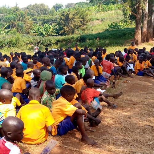 JDI staff addressing students on the rights and child abuse in Pagei Primary school in Kigezi parish, Zeu sub County Zombo District.